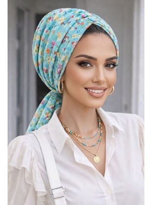 Turkuaz Çiçek Desen Tokalı Bone