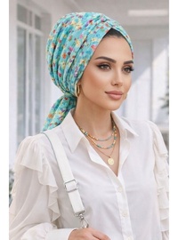 Turkuaz Çiçek Desen Tokalı Bone